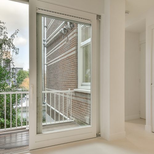 interior of a balcony with sliding glass doors